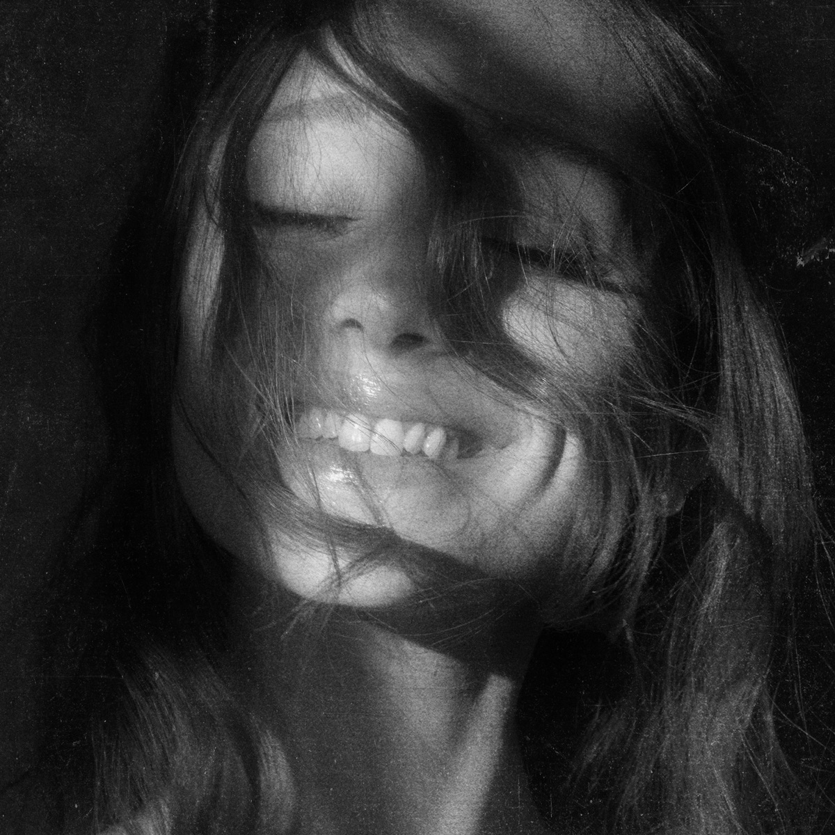 Black-and-white cover artwork for Ariana Grande's album petal